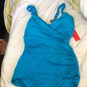 New turquoise one piece swim suit
